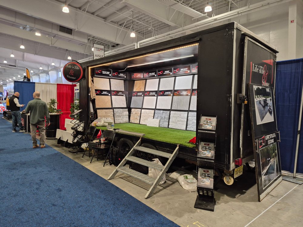 Life's Tile & Stone mobile showroom booth at the Northeast Hardscape Expo